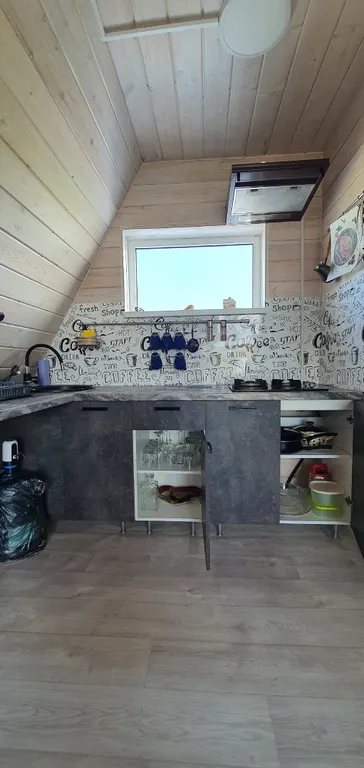 Тpеугольный дом A-frаmе с видом на море