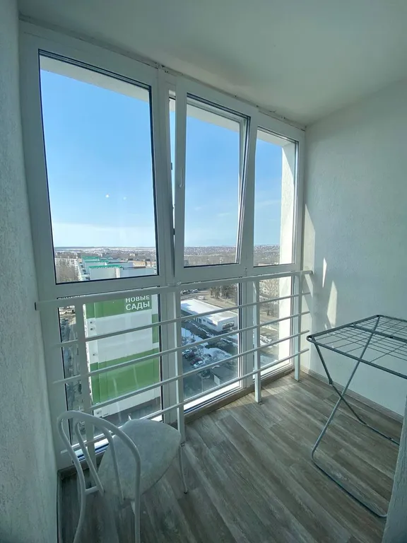 Уютная квартира с ортопедическим матрасом и панорамным балконом