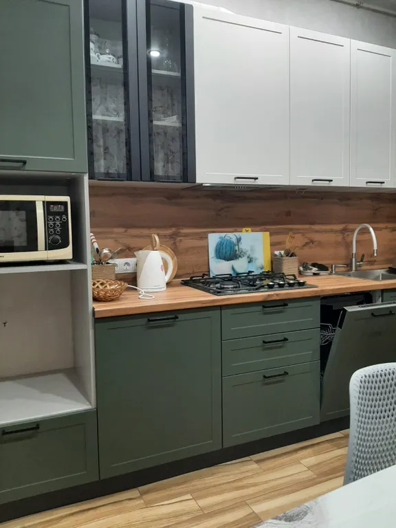 Уютный дом с двориком в центре поселка