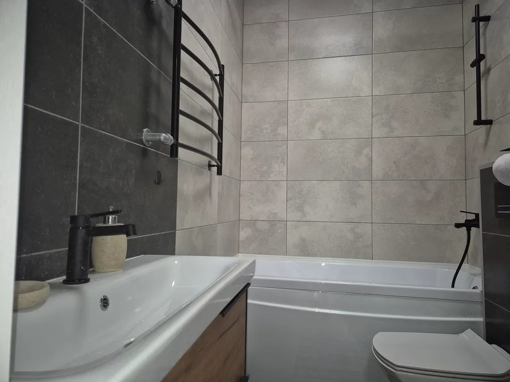 Современная квартира у Глобуса с быстрым выездом на трассу