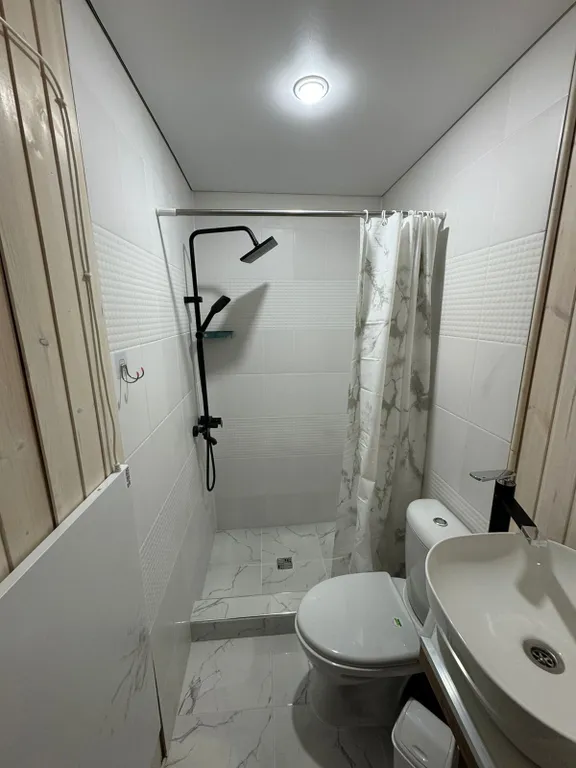 Домик у подножья горы Чегет