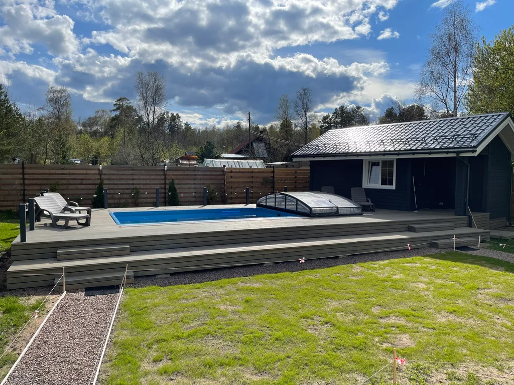Коттедж Дом с бассейном в Карелии — Деревянное