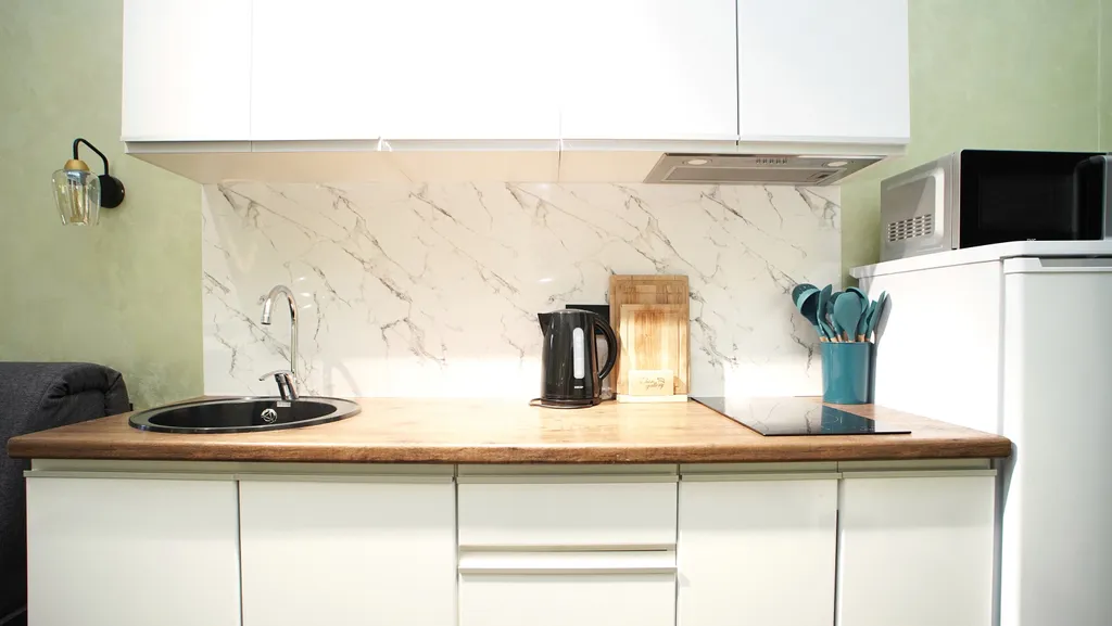 Просторная и уютная студия с балконом, идеальный вид на горы, центр