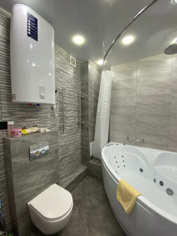 Двухкомнатный премиум апартамент с кондиционером, джакузи и камином