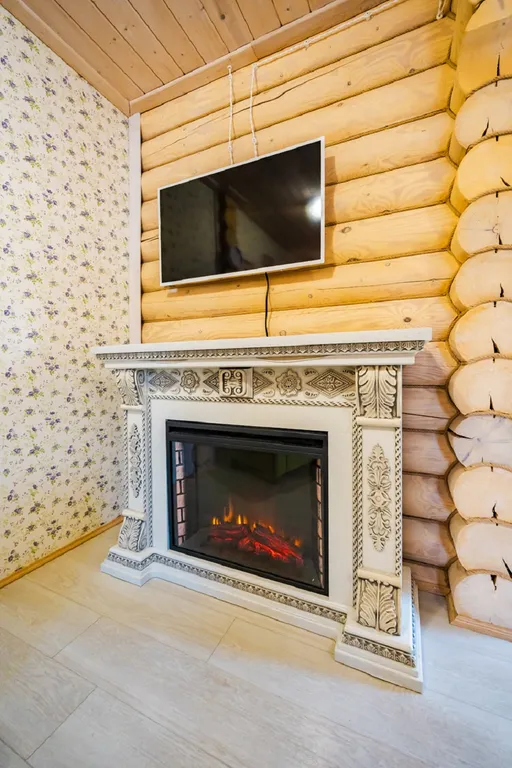 Уютные апартаменты 80 м² c 3-мя спальнями и камином в деревянном доме