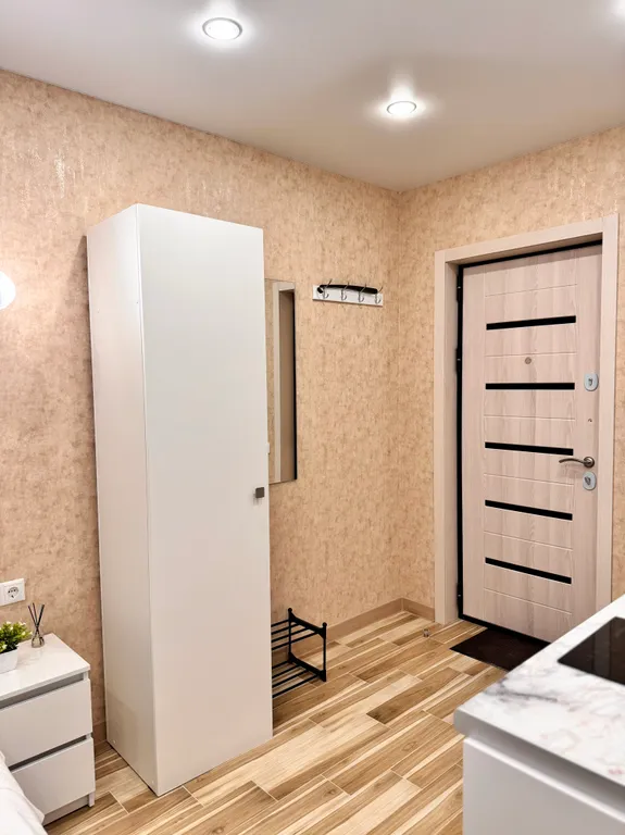 Современная студия в бежевых тонах в Люберцах