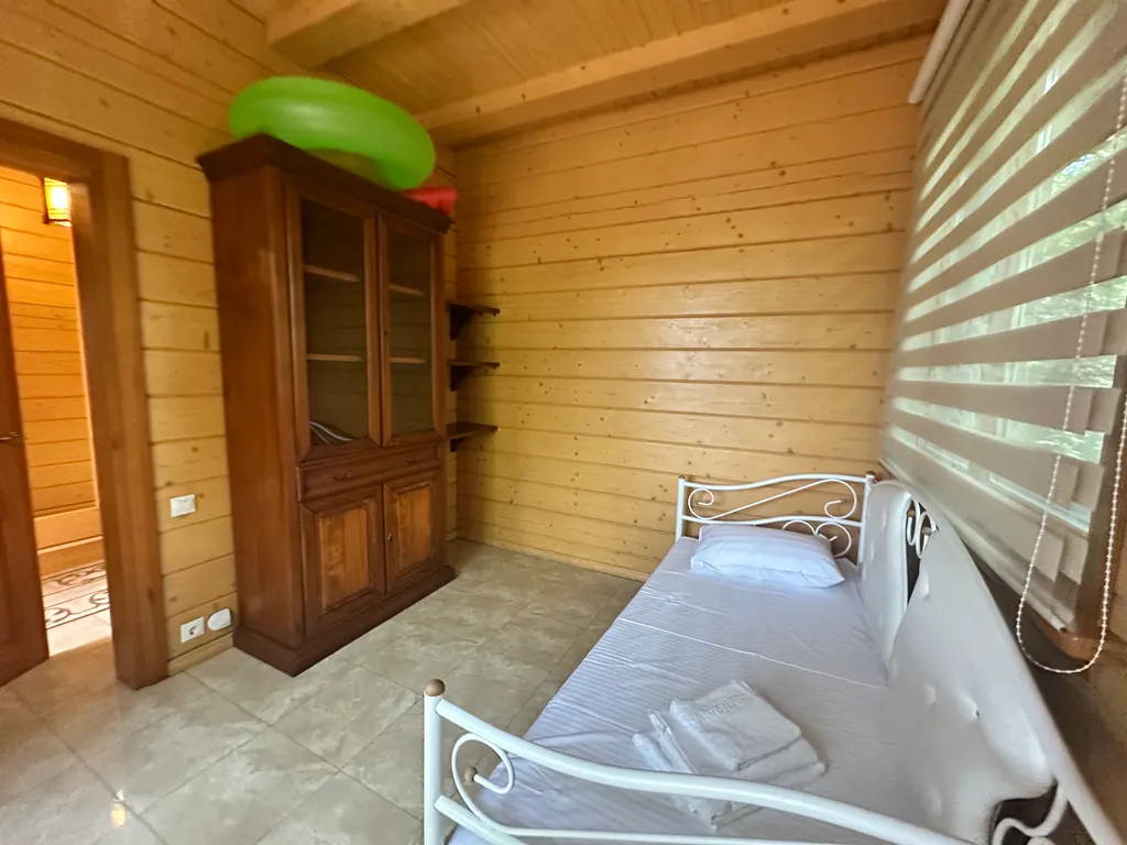 Деревянный дом с приватной территорией