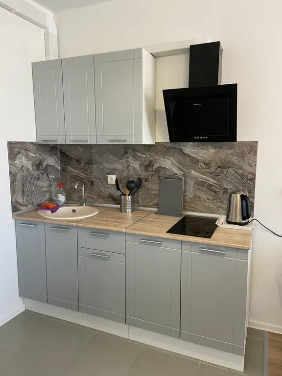 С видом на море, Григорьева