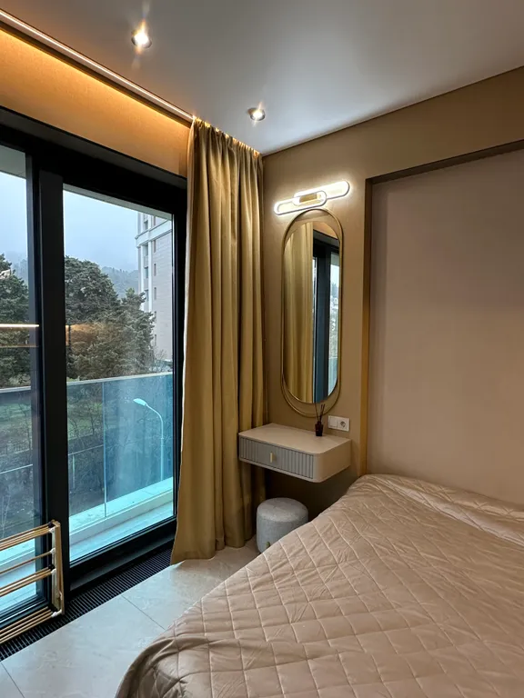 Голд. Стильный апартамент с видом на горы