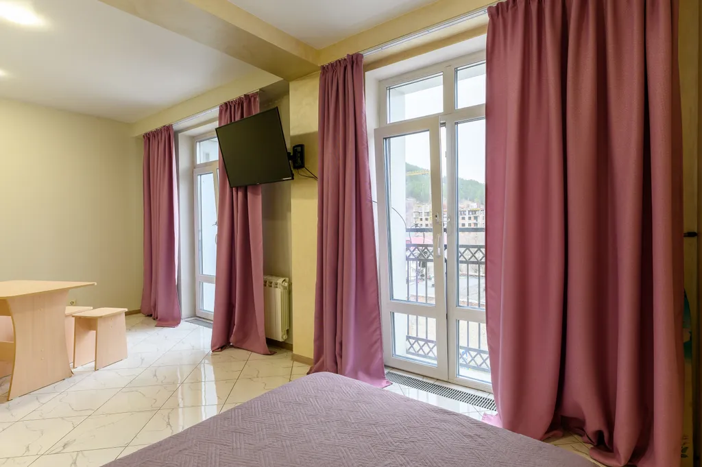 Апартаменты с видом на горы в центре города