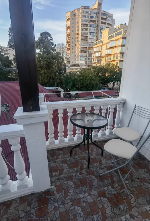 Уютная студия с балконом в центре