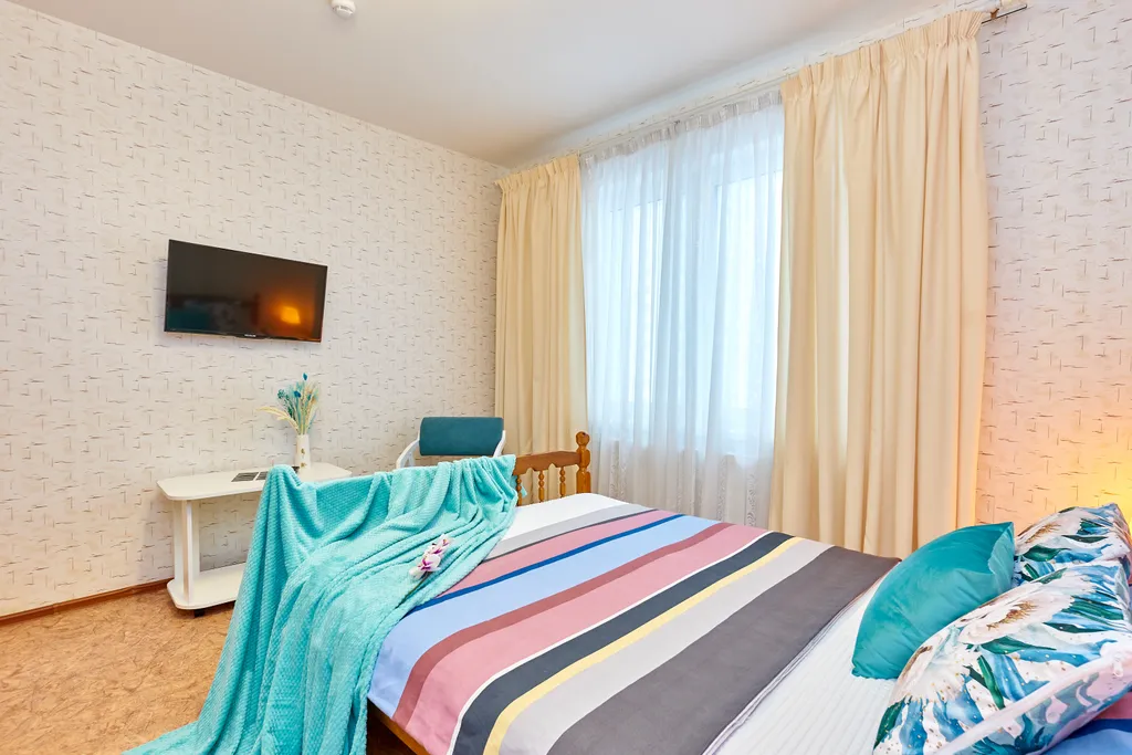 Уютная двухкомнатная квартира с отдельной кухней на 7 человек