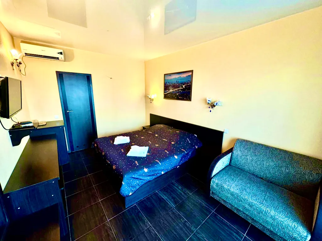 Трёхместный номер с видом на море