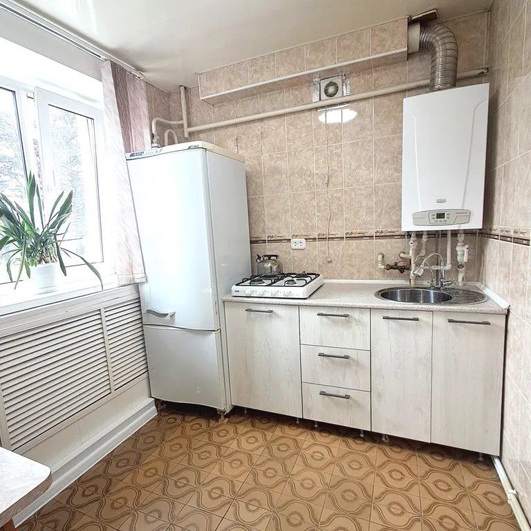 Светлая квартира в центре города с видом на новый сквер