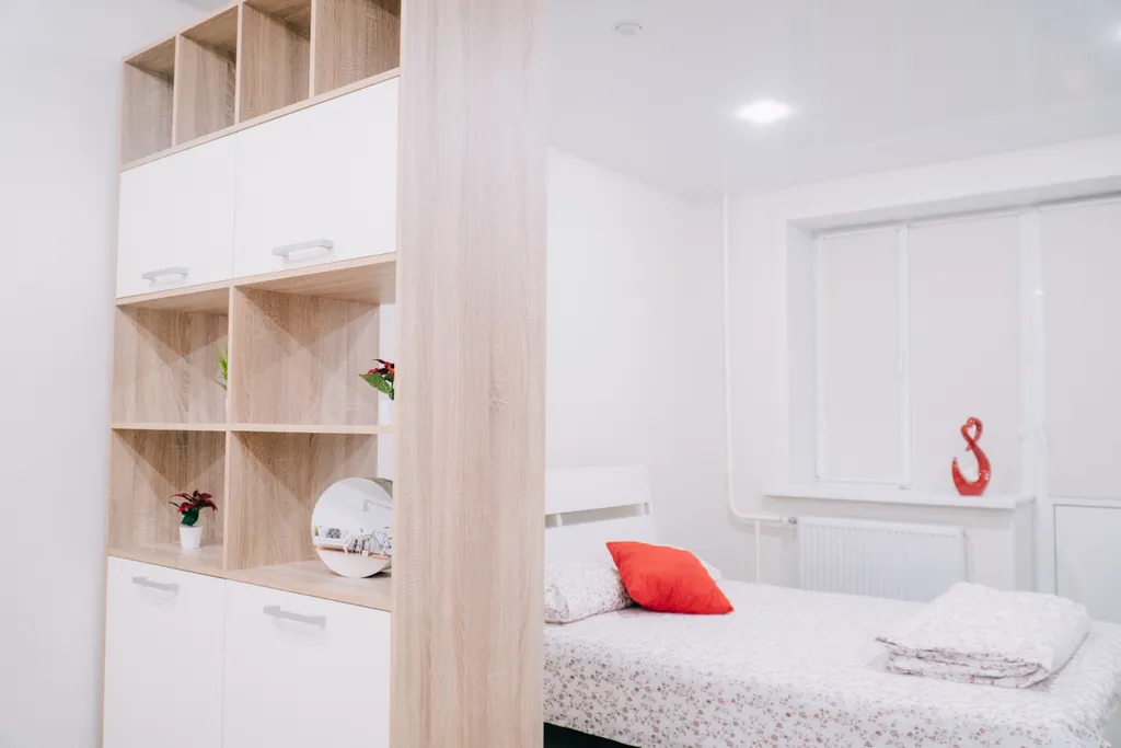 Милая студия для троих. Две кровати