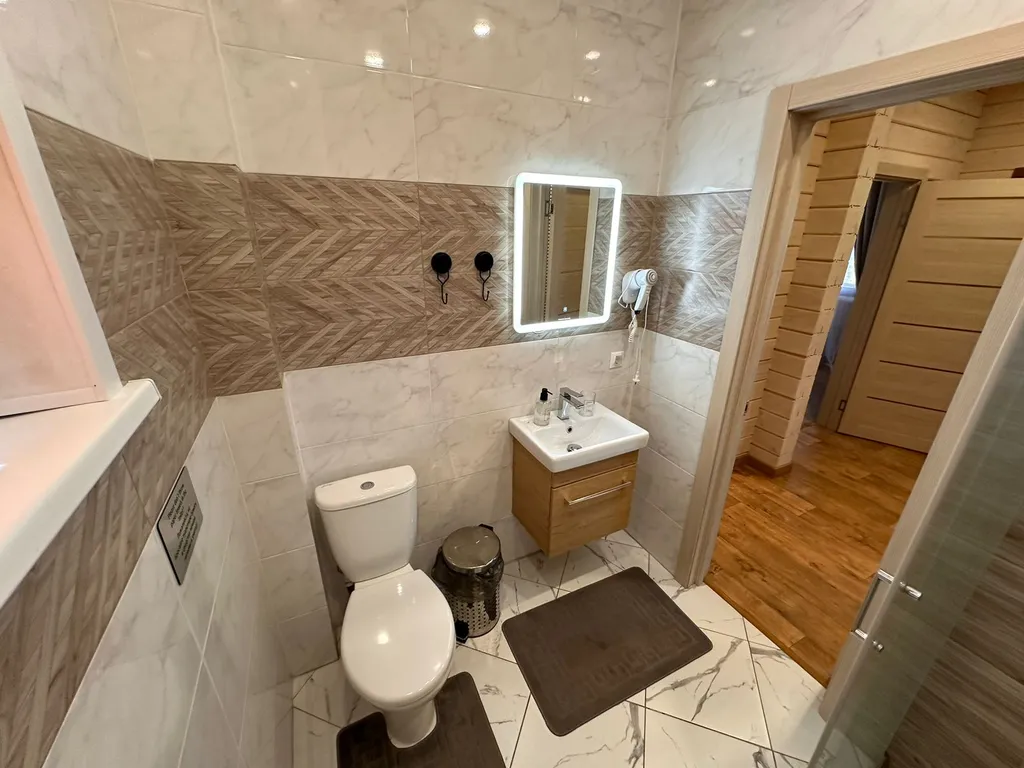 Тёплый коттедж на первой линии озера Волго