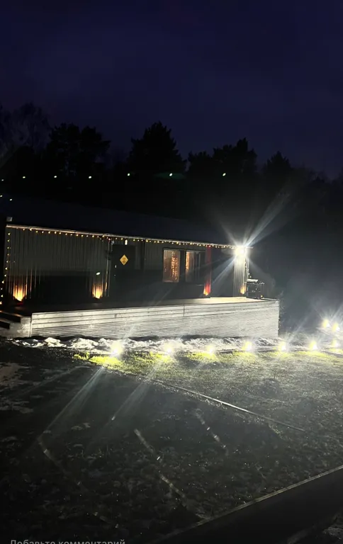 Современный дом с баней в лесу