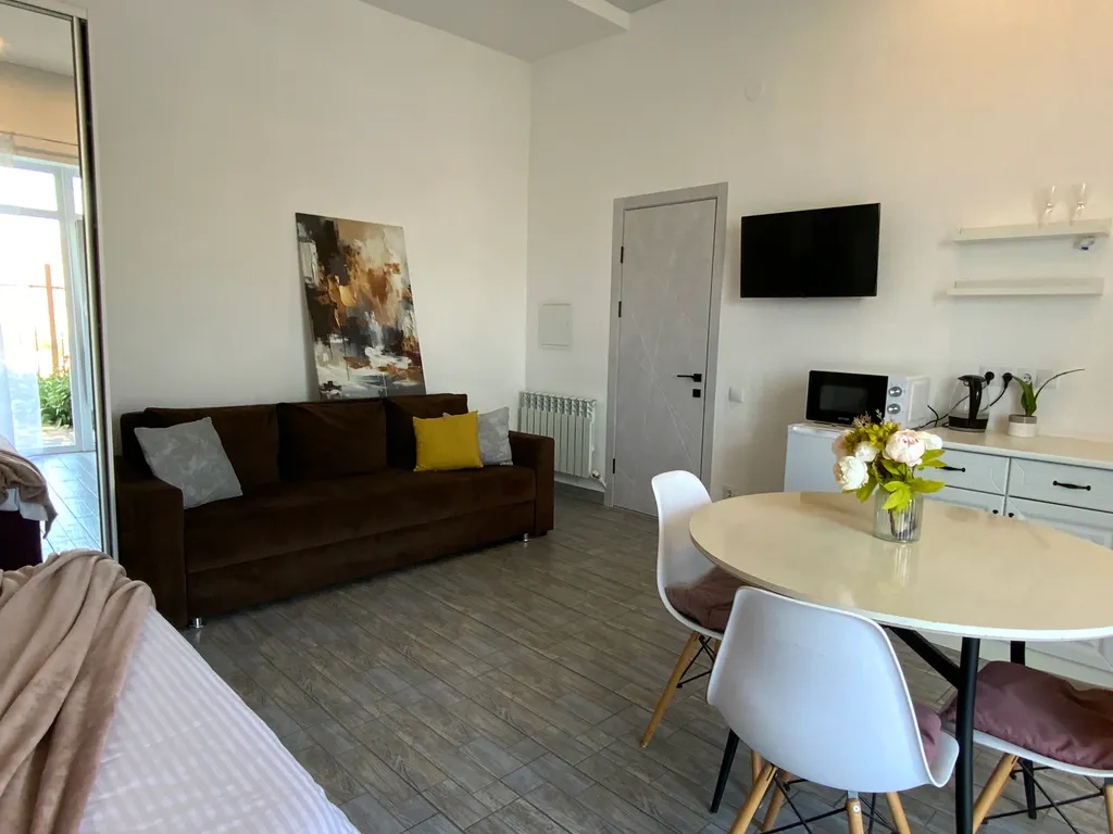 Семейная студия с террасой видом на горы и море