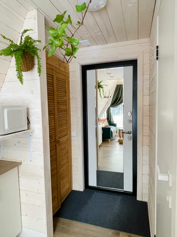 Треугольный дом