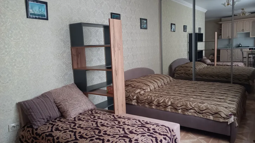 Уютная, светлая студия на первом этаже в тихом месте в центре города