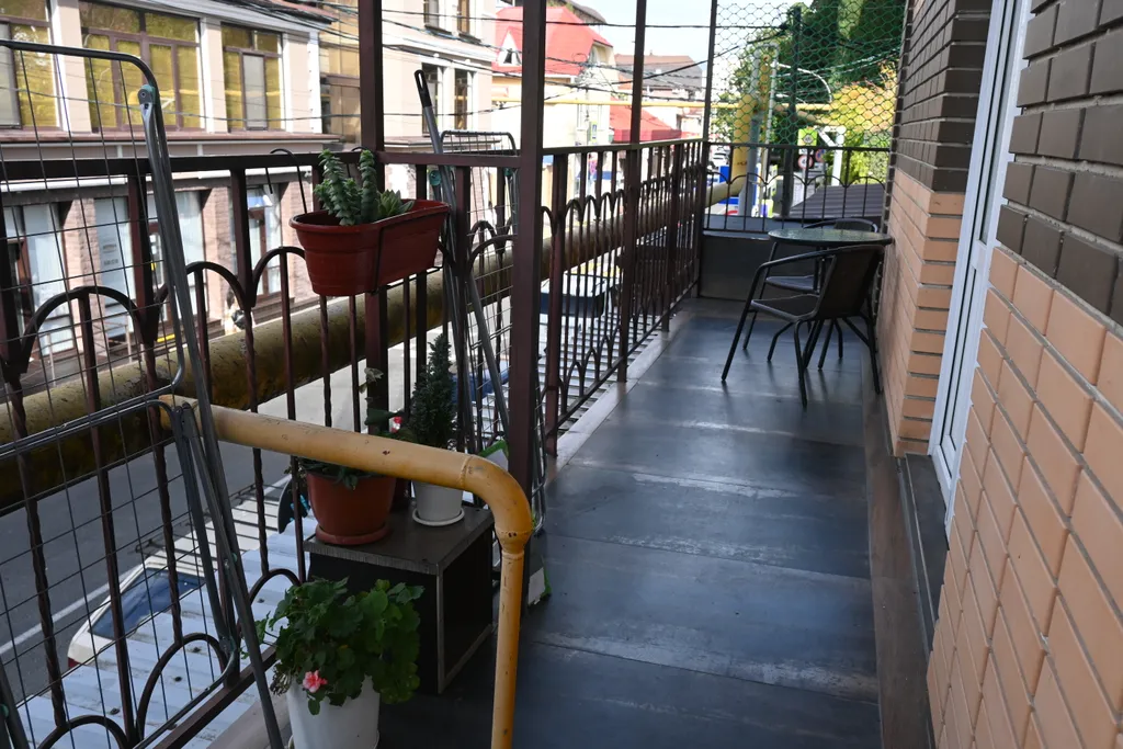 Семейный номер с кухней в центре