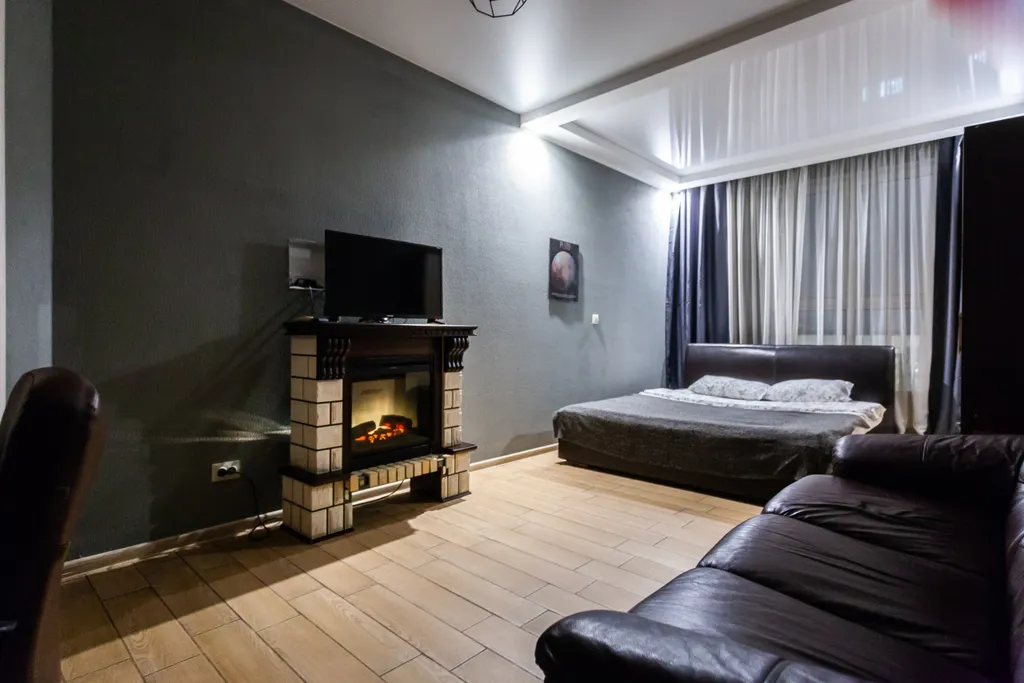 Квартира Квартира с камином, угловой ванной и видом на улицу Красную, уют с характером 24/7 — Краснодар