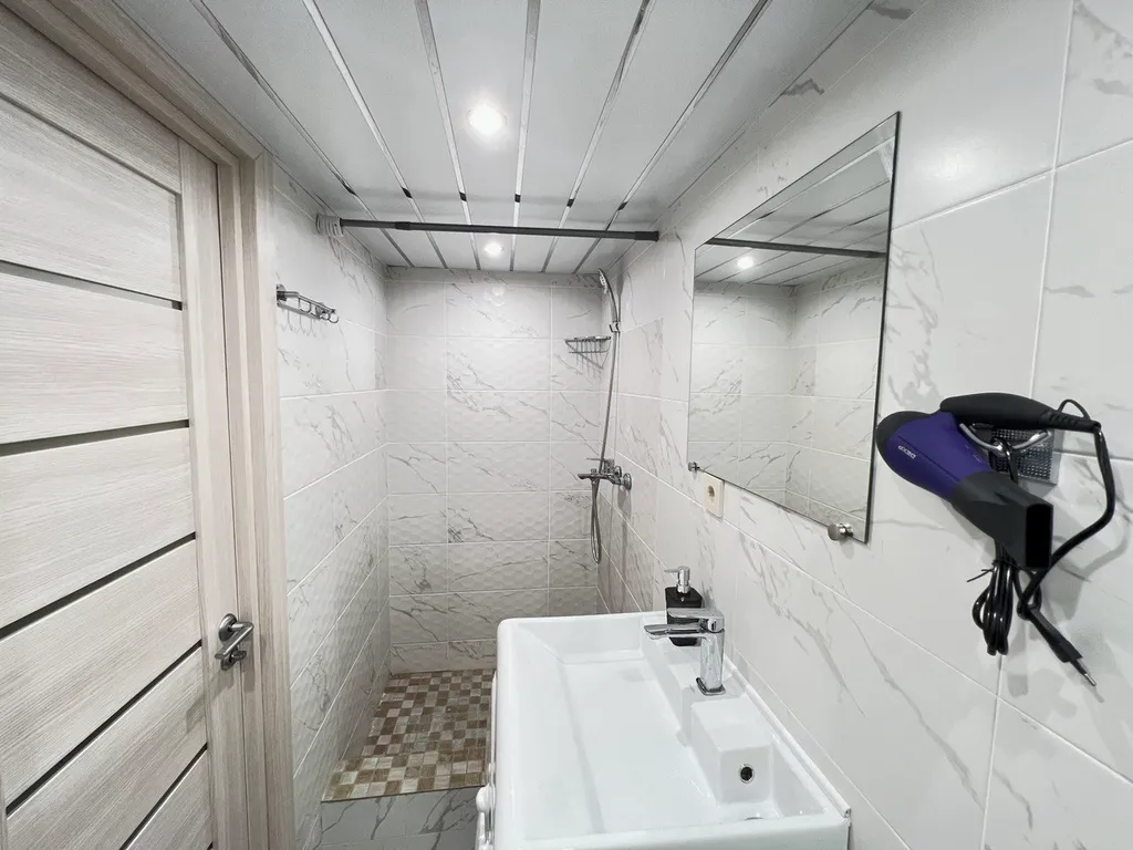 Стильная двухуровневая студия Оранж