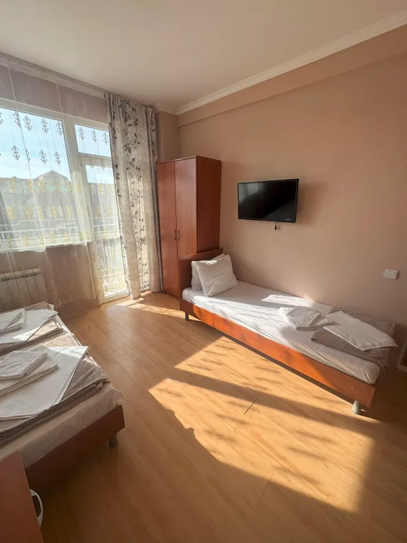 Трёхместный номер с балконом