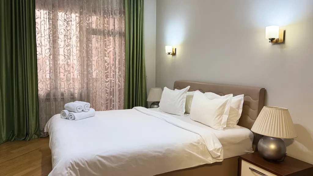 Улучшенные апартаменты с 1 спальней и  балконом в центре города