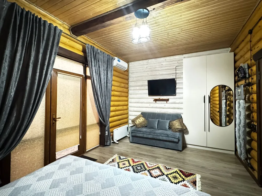 Домик у моря из бруса