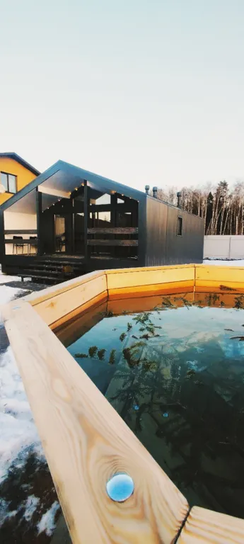 Уютный дом на две семьи в коттеджном поселке