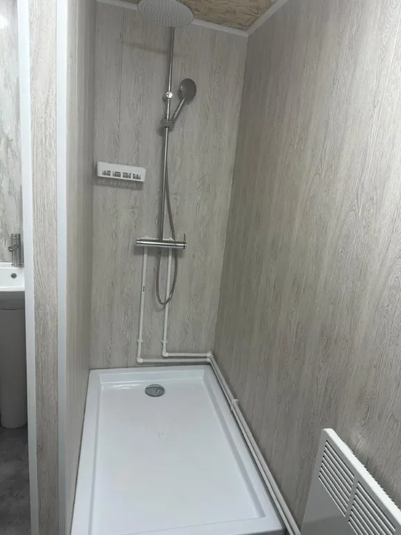 Номер с панорамным видом на горы и речку.