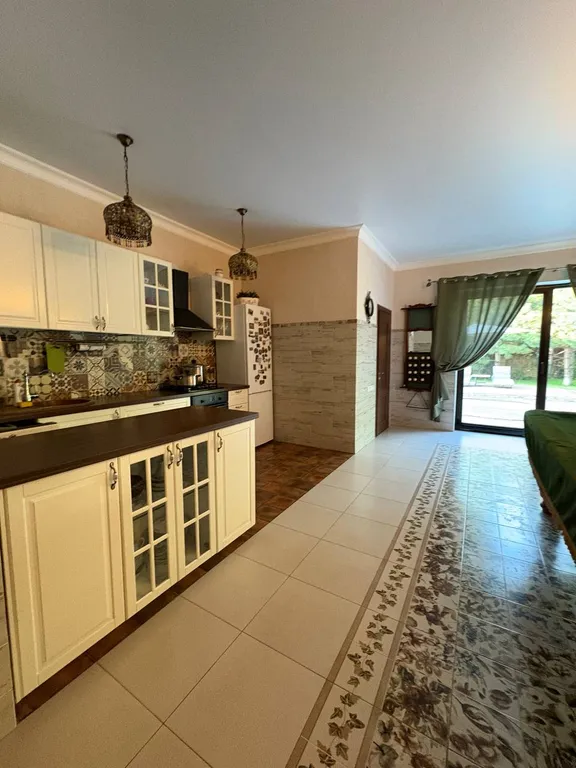 Дом в горах на берегу реки