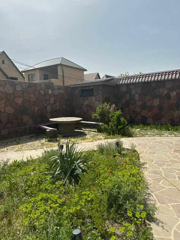 Дом из бруса на берегу моря с зоной барбекю и собственной парной