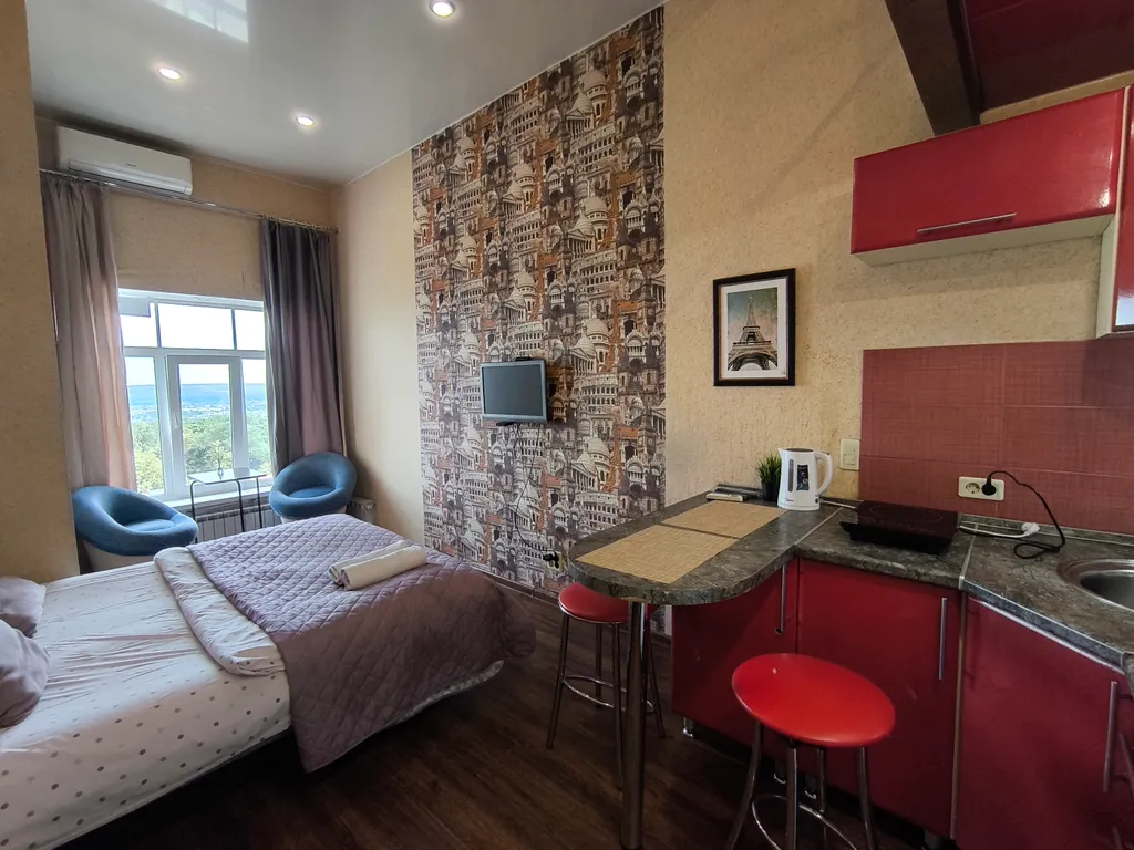 Двухуровневая студия с шикарным видом на весь город