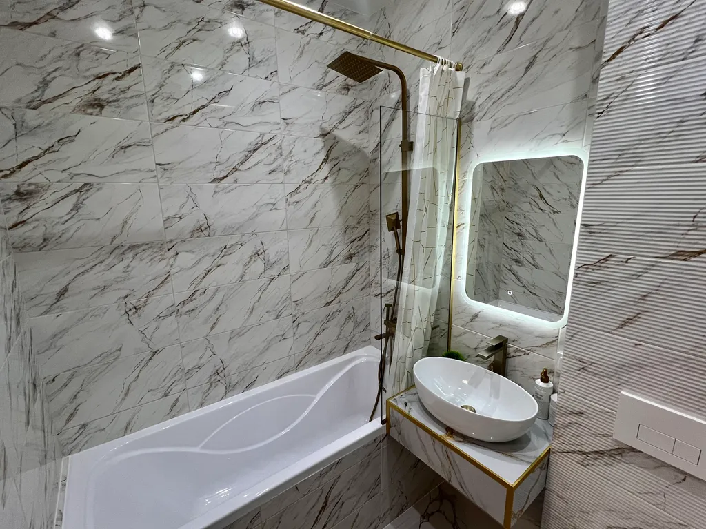 Уютная квартира в элитном доме с дизайнерским ремонтом