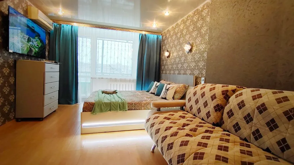 Уютная квартира у набережной и колеса обозрения