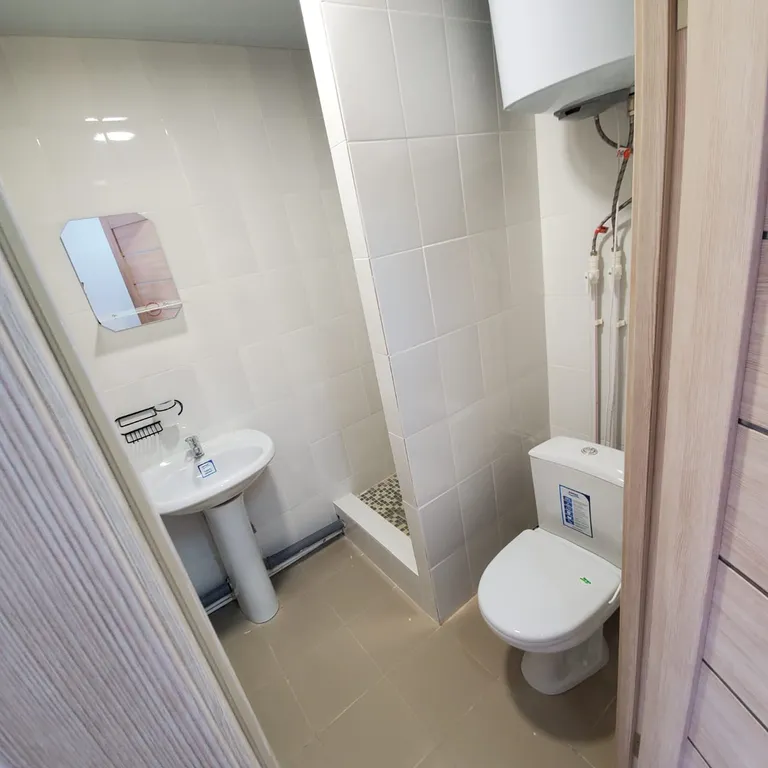 Апартаменты " Как дома" Студия 11 рядом с университетом.