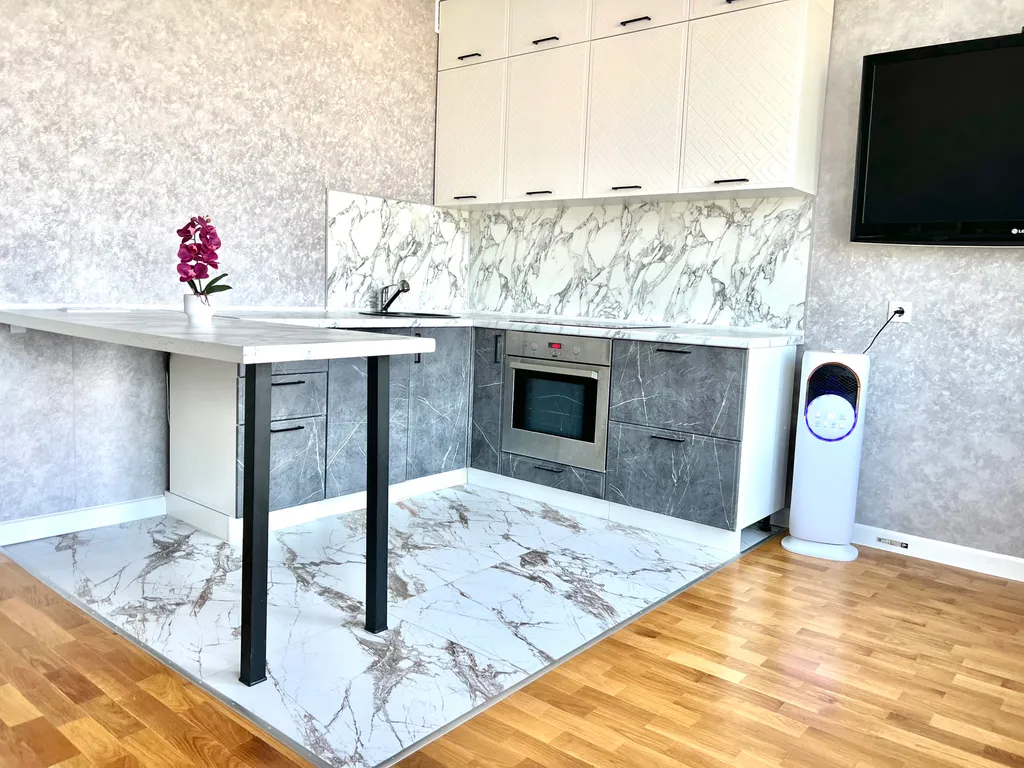 Новая квартира с прекрасными видами в центре города у канатной дороги