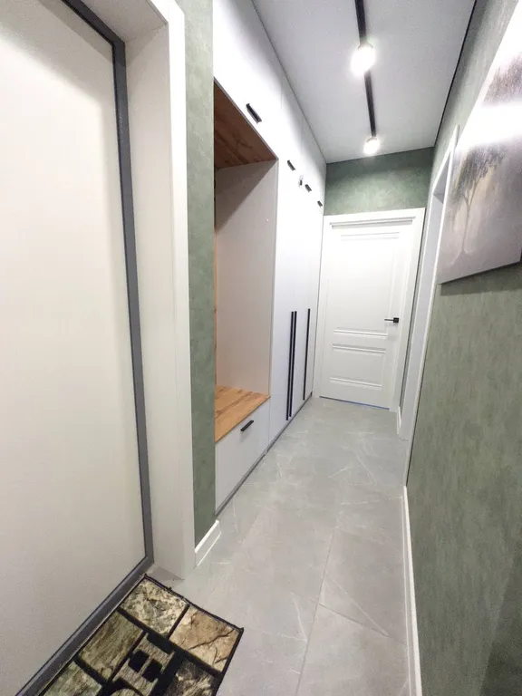 Уютная квартира с большим ТВ