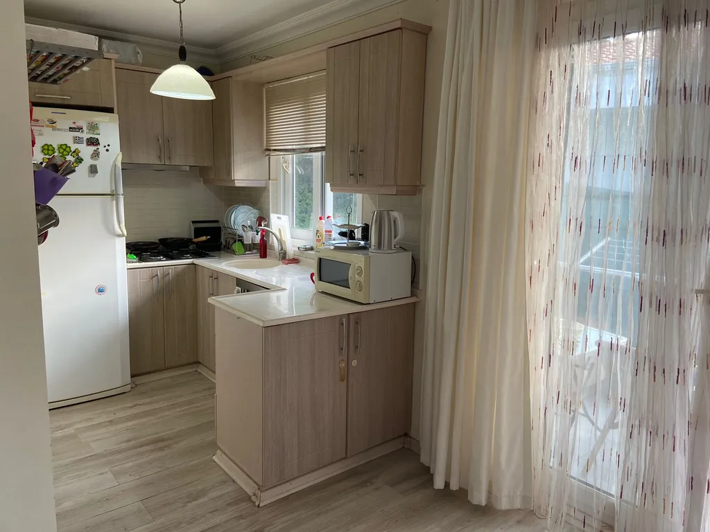 Апартамент с бассейном во дворе в райском уголке Ичмелера