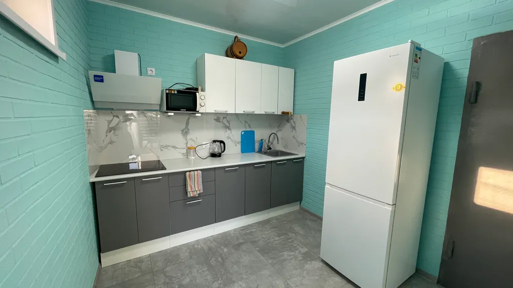 Уютный, просторный номер с общей кухней