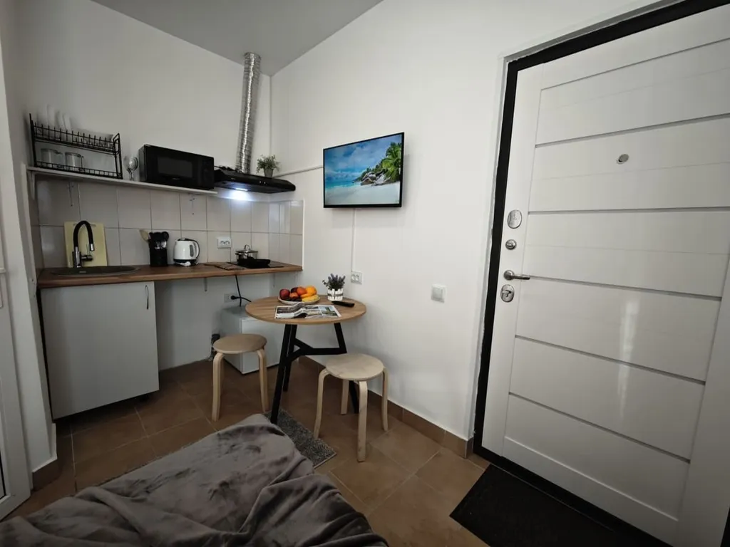 Уютная студия на двоих с кроватью-трансформером