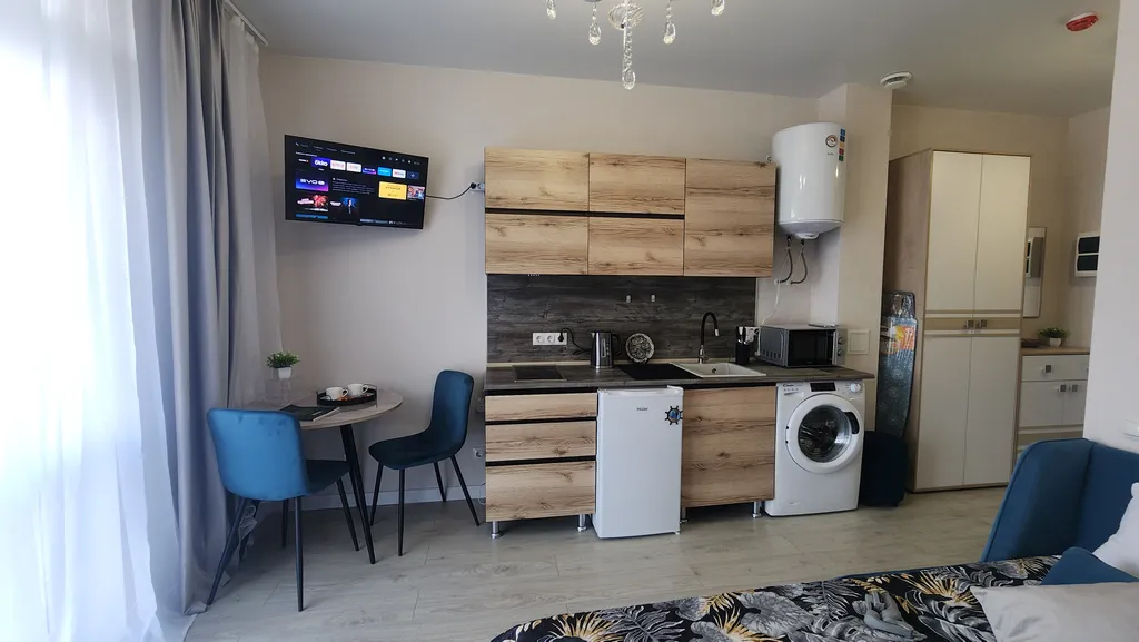 Уютная студия в корпусе с бассейном