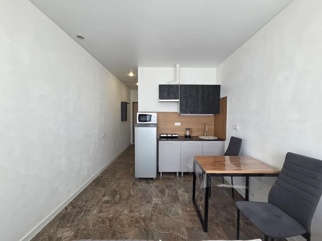 Уютная студия с видом на город