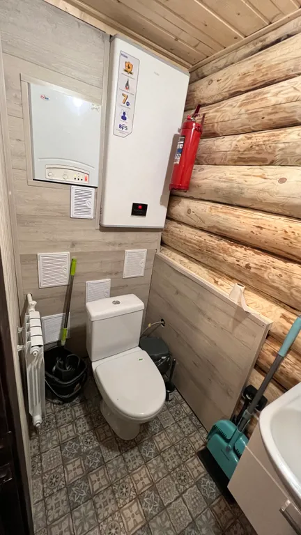 Рубленный дом - баня с террасой