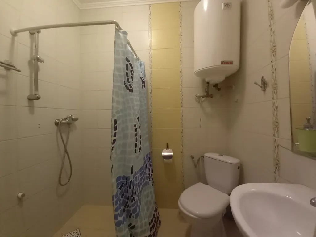 Часть дома с зеленым двориком на Косе у моря