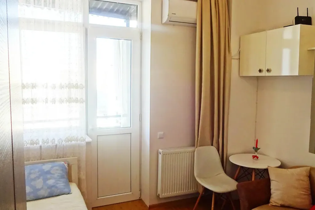 Солнечная квартира-студия с прекрасным видом в центре