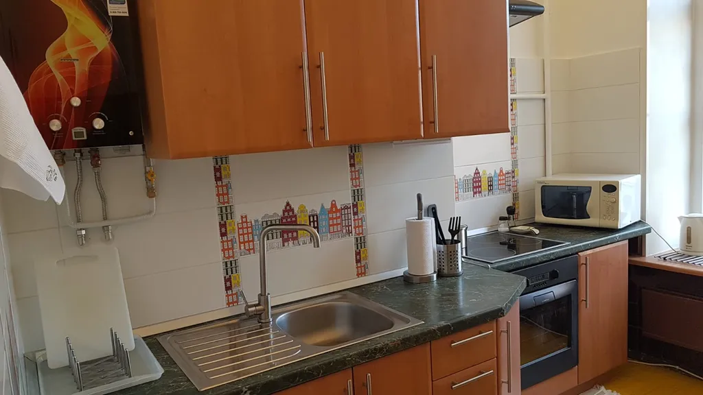 Квартира Квартира в 1 минуте от Невского проспекта, 2 спальни и вид на крыши — Санкт-Петербург