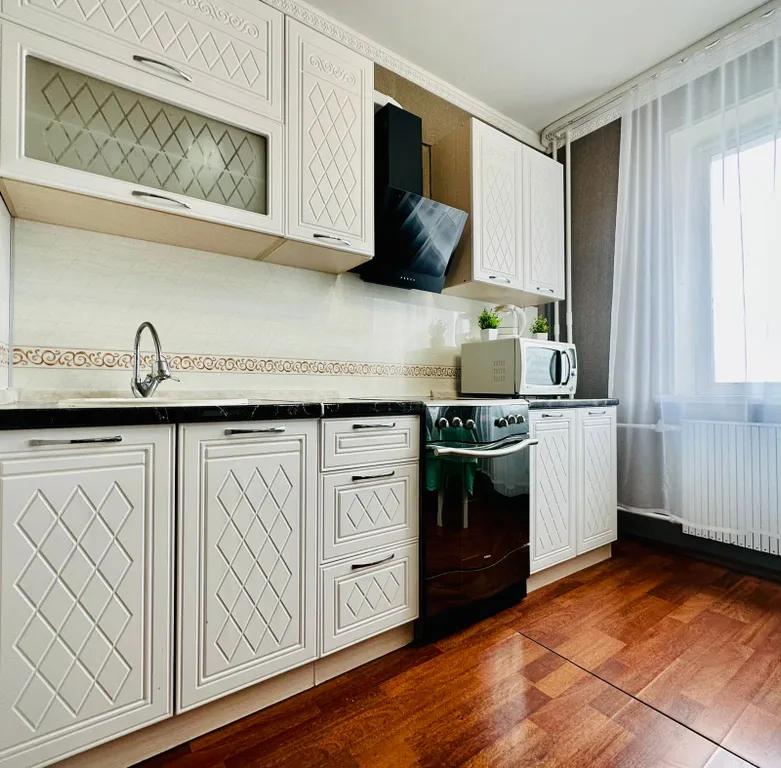 Уютная 1-комнатная квартира с балконом в центре города